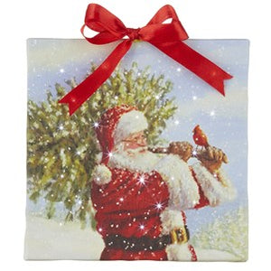 Raz Imports RI 4239401 6" Santa Carrying Christmas Tree Lighted Print Ornament w/ Easel Back